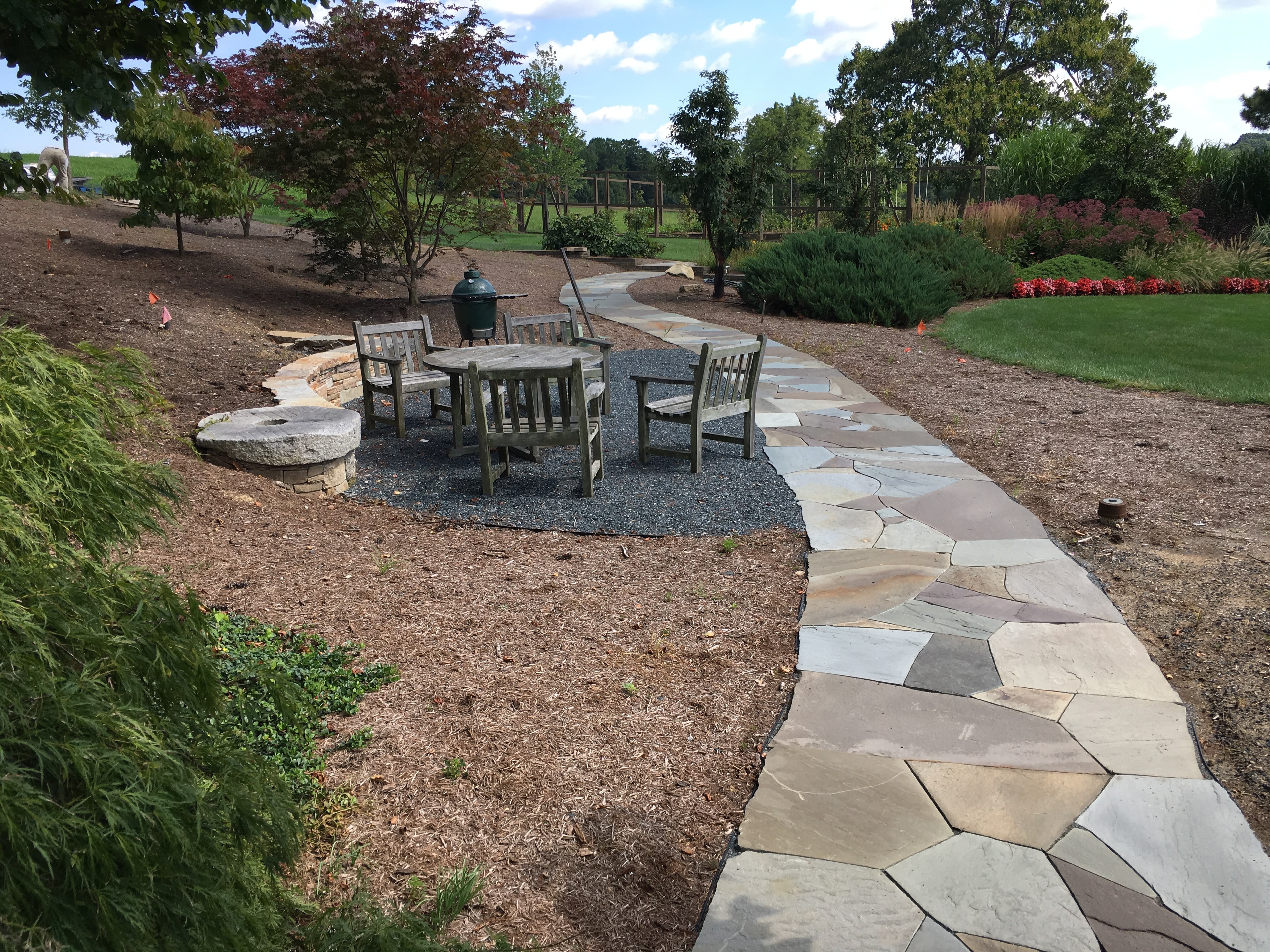 WildWorks curved stone walk and landscape